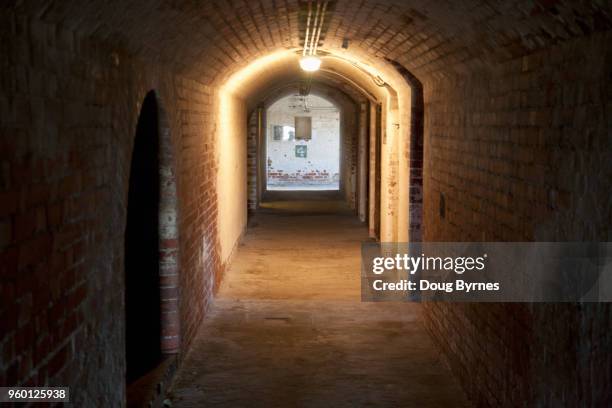 underground brick tunnel - doug byrnes stock-fotos und bilder