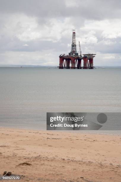 floating oil rig - doug byrnes stock pictures, royalty-free photos & images