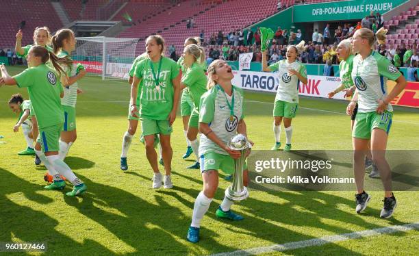 Anna Blaesse of Wolfsburg and teammates celebrate the winning of the trophy after the Women's DFB Cup Final between VFL Wolfsburg and FC Bayern...