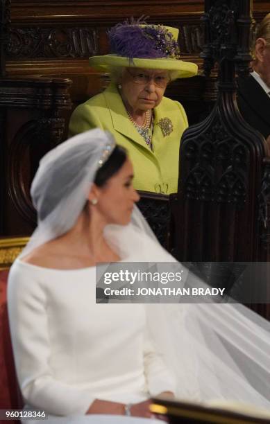 Britain's Queen Elizabeth II looks on during the wedding ceremony of Britain's Prince Harry, Duke of Sussex and US actress Meghan Markle in St...