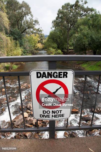 no dive sign - doug byrnes stock pictures, royalty-free photos & images