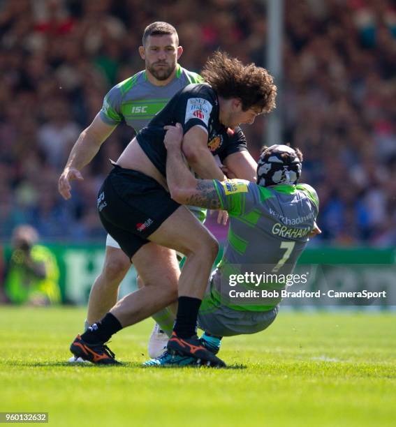 Exeter Chiefs' Alec Hepburn is tackled by Newcastle Falcons' Gary Graham during the Aviva Premiership Semi Final between Exeter Chiefs and Newcastle...