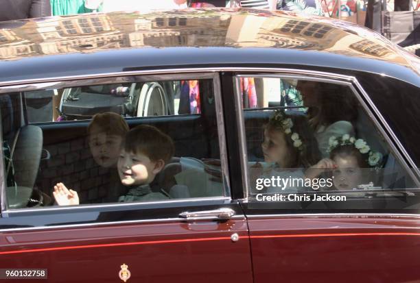 Prince George, Jasper Dyer, Florence van Cutsem and Princess Charlotte attend the wedding of Prince Harry to Ms Meghan Markle at St George's Chapel,...