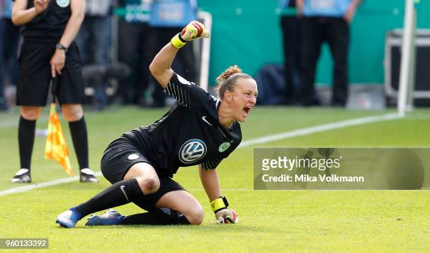 Goalkeeper Almuth Schult of Wolfsburg celebrates after saving a penalty kick during the Women's DFB Cup Final between VFL Wolfsburg and FC Bayern...