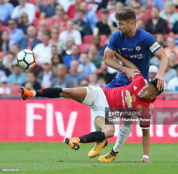 Alexis Sanchez of Manchester United in action with Gary Cahill of Chelsea during the Emirates FA Cup Final match between Manchester United and...