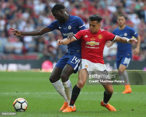 Alexis Sanchez of Manchester United in action with Tiemoue Bakayoko of Chelsea during the Emirates FA Cup Final match between Manchester United and...