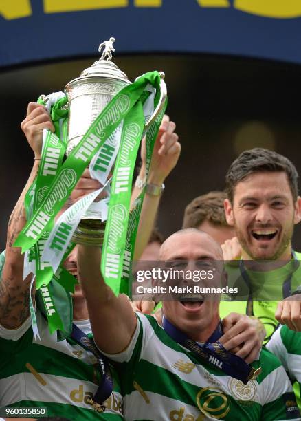 Scott Brown of Celtic lifts the Scottish Cup as Celtic beat Motherwell 2-0 during the Scottish Cup Final between Celtic and Motherwell at Hampden...