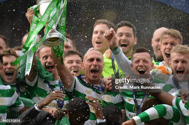 Scott Brown of Celtic lifts the Scottish Cup as Celtic beat Motherwell 2-0 during the Scottish Cup Final between Celtic and Motherwell at Hampden...