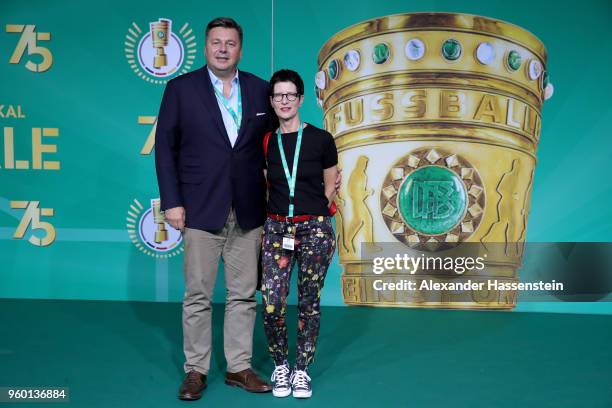 Senator for Interior of Berlin Andreas Geisel and his wife Anke pose for a photograph prior to the DFB Cup Final 2018 between Bayern Muenchen and...