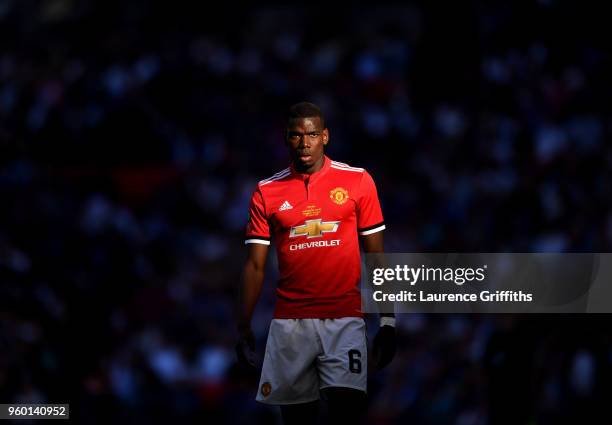 Paul Pogba of Manchester United looks on during The Emirates FA Cup Final between Chelsea and Manchester United at Wembley Stadium on May 19, 2018 in...