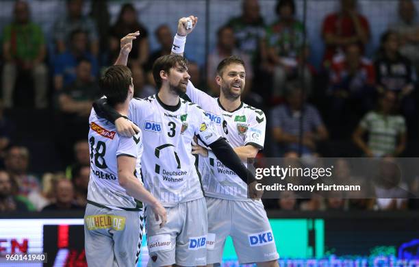 Hans Lindberg, Fabian Wiede and Drago Vukovic of Fuechse Berlin celebrate during the Ottostadt Magdeburg EHF Cup Final Four 2018 Semifinal match...