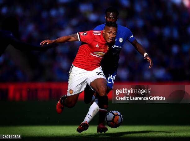 Antonio Valencia of Manchester United is challenged by Tiemoue Bakayoko of Chelsea during The Emirates FA Cup Final between Chelsea and Manchester...