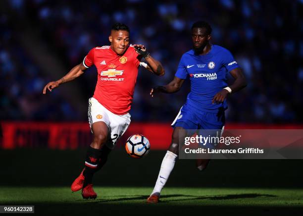 Antonio Valencia of Manchester United is challenged by Tiemoue Bakayoko of Chelsea during The Emirates FA Cup Final between Chelsea and Manchester...