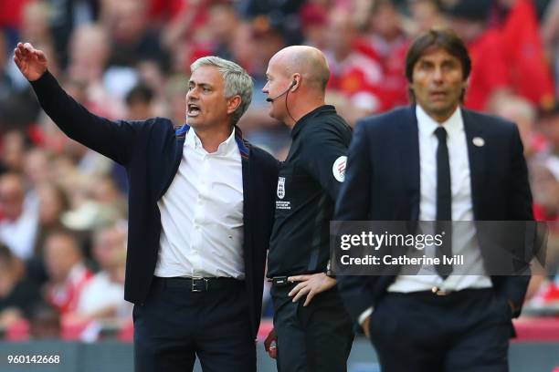 Jose Mourinho, Manager of Manchester United speaks with Lee Mason, fourth official during The Emirates FA Cup Final between Chelsea and Manchester...