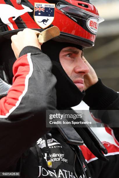 James Davison, driver of the Byrd-Hollinger-Belardi Racing Chevrolet, pulls his helmet on for qualifying for the Indianapolis 500 on May 19 at the...