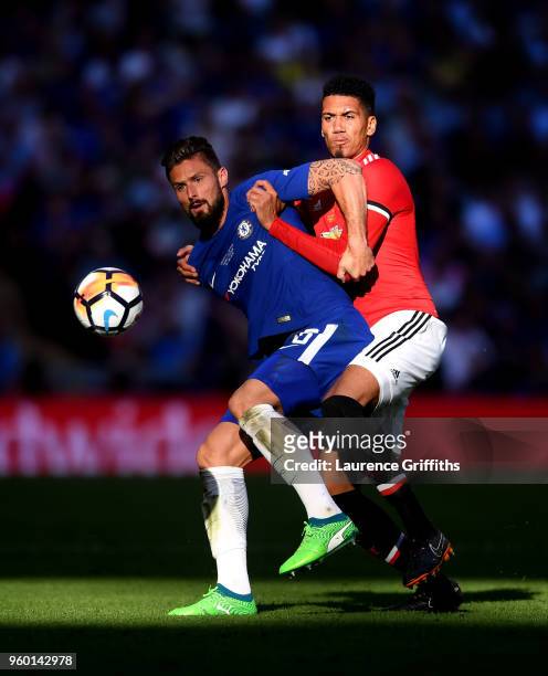 Olivier Giroud of Chelsea is challenged by Chris Smalling of Manchester United during The Emirates FA Cup Final between Chelsea and Manchester United...