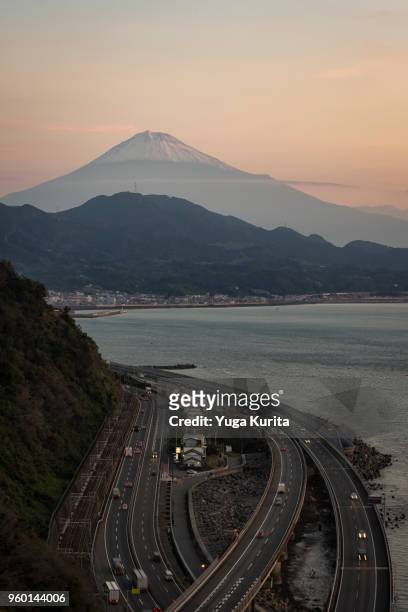 mt. fuji over highways at sunrise - suruga bay stock pictures, royalty-free photos & images