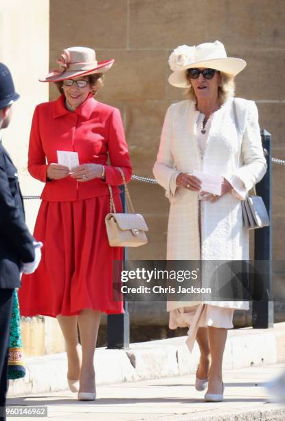 Guests attend the wedding of Prince Harry to Ms Meghan Markle at St George's Chapel, Windsor Castle on May 19, 2018 in Windsor, England. Prince Henry...