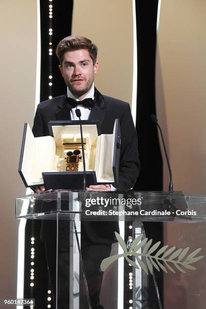 Director Lukas Dhont accepts the receives the Un Certain Regard 2018 Best Director award for 'Girl' on stage during the Closing Ceremony at the 71st...