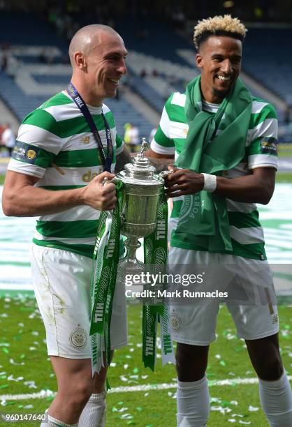 Scott Brown , and Scott Sinclair of Celtic celebrates as Celtic beat Motherwell 2-0 during the Scottish Cup Final between Celtic and Motherwell at...