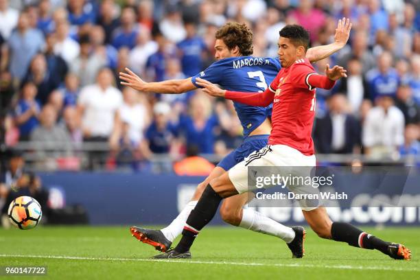 Marcos Alonso of Chelsea shoots under pressure from Chris Smalling of Manchester United during The Emirates FA Cup Final between Chelsea and...