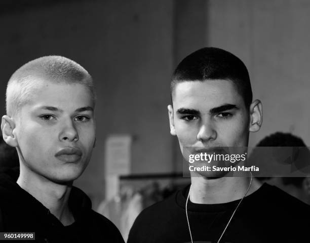 This image was converted to black and white.) A model prepares backstage ahead of the St.George NextGen show at Mercedes-Benz Fashion Week Resort 19...