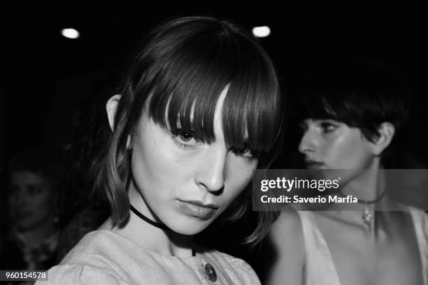 This image was converted to black and white.) A model prepares backstage ahead of the Hansen & Gretel show at Mercedes-Benz Fashion Week Resort 19...