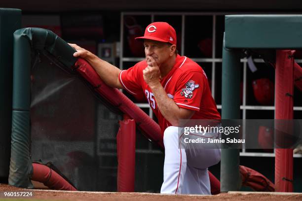 Interim Manager Jim Riggleman of the Cincinnati Reds watches the action in the first inning against the Chicago Cubs at Great American Ball Park on...