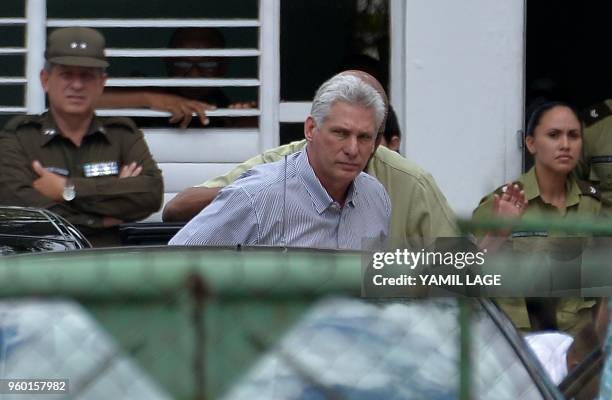 Cuban President Miguel Diaz-Canel arrives at the Institute of Legal Medicine to meet relatives of the victims of a plane that crashed shortly after...