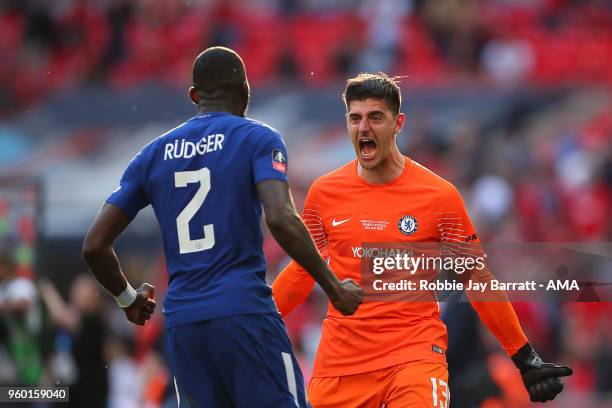 Thibaut Courtois of Chelsea celebrates with Antonio Rudiger at the end of the Emirates FA Cup Final between Chelsea and Manchester United at Wembley...