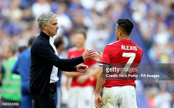 Manchester United manager Jose Mourinho shakes hands with Manchester United's Alexis Sanchez after the final whistle during the Emirates FA Cup Final...