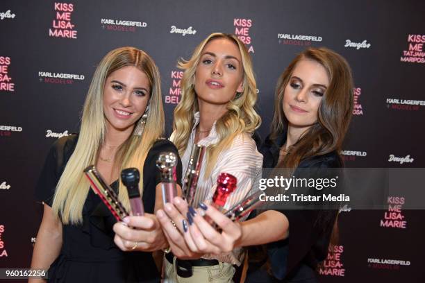 Mrs Bella, Tatjana Mariposa and Lisa-Marie Schiffner during the 'Kiss Me Karl Limited Edition' Launch at Douglas Store on May 19, 2018 in Berlin,...