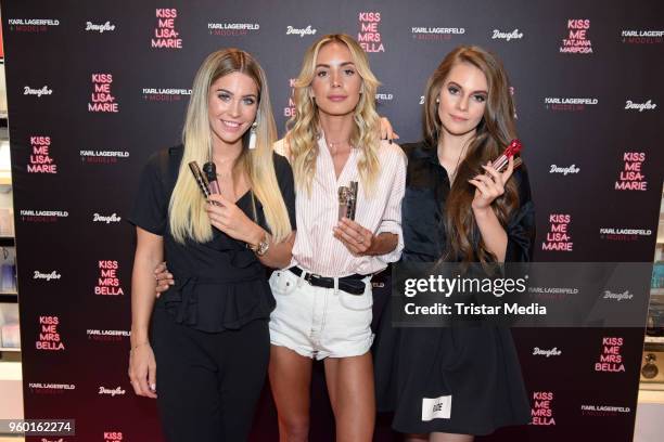 Mrs Bella, Tatjana Mariposa and Lisa-Marie Schiffner during the 'Kiss Me Karl Limited Edition' Launch at Douglas Store on May 19, 2018 in Berlin,...