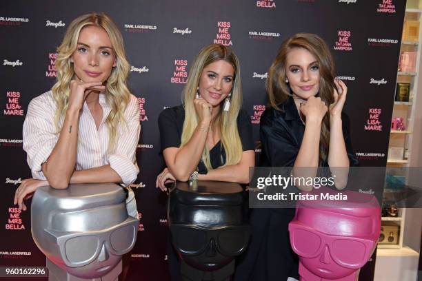 Mrs Bella, Tatjana Mariposa and Lisa-Marie Schiffner during the 'Kiss Me Karl Limited Edition' Launch at Douglas Store on May 19, 2018 in Berlin,...