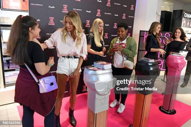 Mrs Bella, Tatjana Mariposa and Lisa-Marie Schiffner during the 'Kiss Me Karl Limited Edition' Launch at Douglas Store on May 19, 2018 in Berlin,...