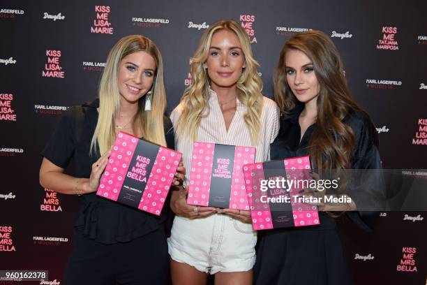 Mrs Bella, Tatjana Mariposa and Lisa-Marie Schiffner during the 'Kiss Me Karl Limited Edition' Launch at Douglas Store on May 19, 2018 in Berlin,...