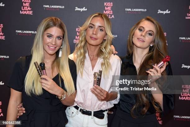 Mrs Bella, Tatjana Mariposa and Lisa-Marie Schiffner during the 'Kiss Me Karl Limited Edition' Launch at Douglas Store on May 19, 2018 in Berlin,...