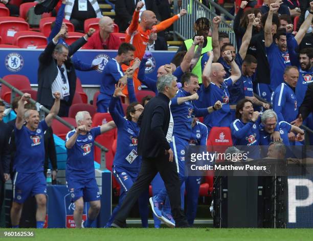 Manager Jose Mourinho of Manchester United walks over to congratulate Manager Antonio Conte of Chelsea after the Emirates FA Cup Final match between...
