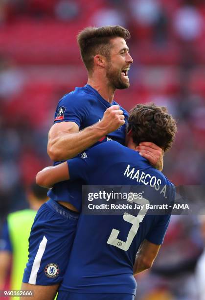 Gary Cahill of Chelsea and Marcos Alonso celebrate at the end of the Emirates FA Cup Final between Chelsea and Manchester United at Wembley Stadium...