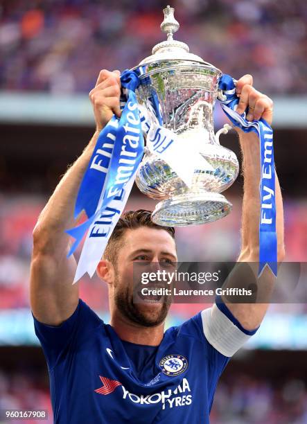 Gary Cahill of Chelsea lifts the Emirates FA Cup trophy following his sides victory in The Emirates FA Cup Final between Chelsea and Manchester...