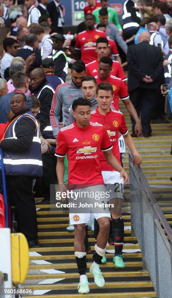 Jesse Lingard, Ander Herrera and Matteo Darmian of Manchester United show their disappointment after the Emirates FA Cup Final match between...