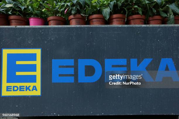The logo of the largest German supermarket corporation EDEKA, currently holding a market share of 26% is seen in Munich.