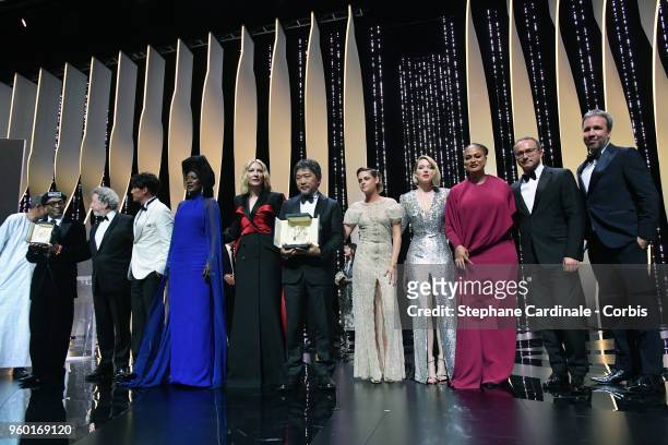 Director Spike Lee holds the Grand Prix award for 'BlacKkKlansman' as jury members Robert Guediguian, Chang Chen, Khadja Nin, Jury president Cate...