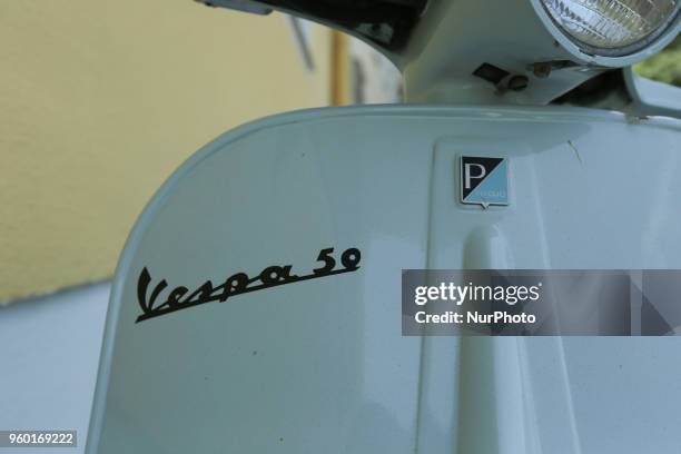 The logo of the Italian brand Vespa of scooter manufactured by Piaggio is seen in Munich.