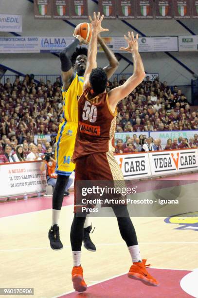 Henry Sims of Vanoli competes with Mitchell Watt of Umana during the LBA LegaBasket match Game 1 of play off's quarter finals between Reyer Umana...