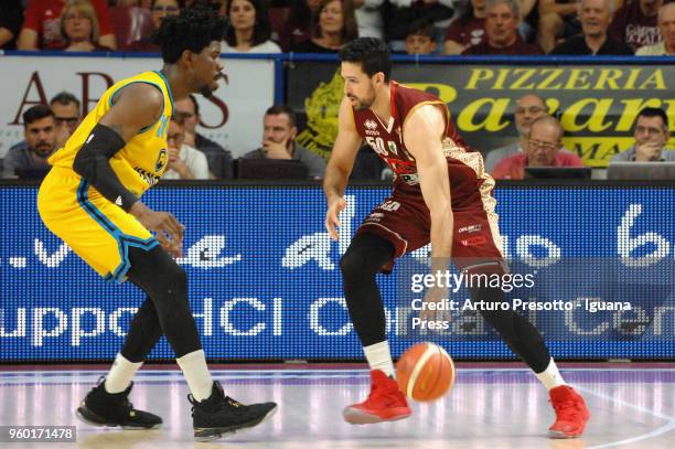 Mitchell Watt of Umana competes with Henry Sims of Vanoli during the LBA LegaBasket match Game 1 of play off's quarter finals between Reyer Umana...