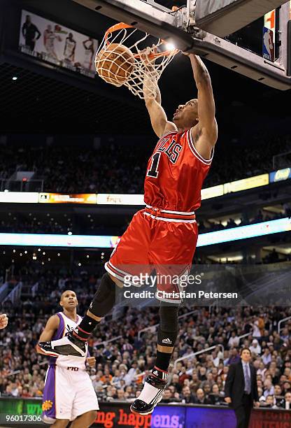 Derrick Rose of the Chicago Bulls slam dunks the ball against the Phoenix Suns during the NBA game at US Airways Center on January 22, 2010 in...