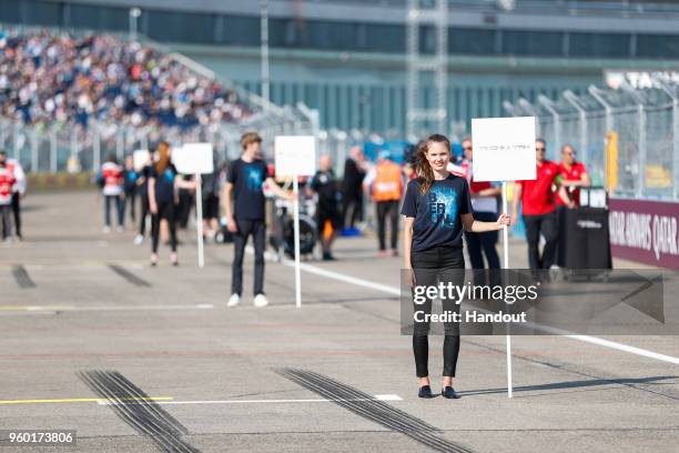 In this handout provided by FIA Formula E, Grid kids line up. During the Berlin E-Prix in the Paris ePrix, Round 9 of the 2017/18 FIA ABB Formula E...