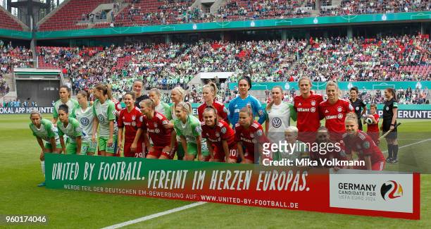 Group photo with both teams prior the Women's DFB Cup Final between VFL Wolfsburg and FC Bayern Muenchen at RheinEnergieStadion on May 19, 2018 in...