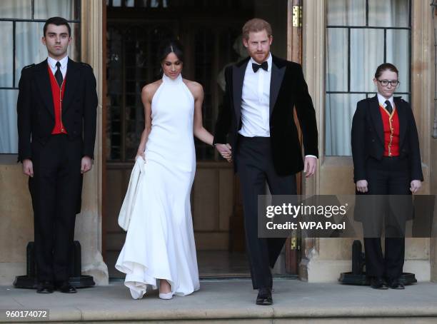 Duchess of Sussex and Prince Harry, Duke of Sussex leave Windsor Castle after their wedding to attend an evening reception at Frogmore House, hosted...